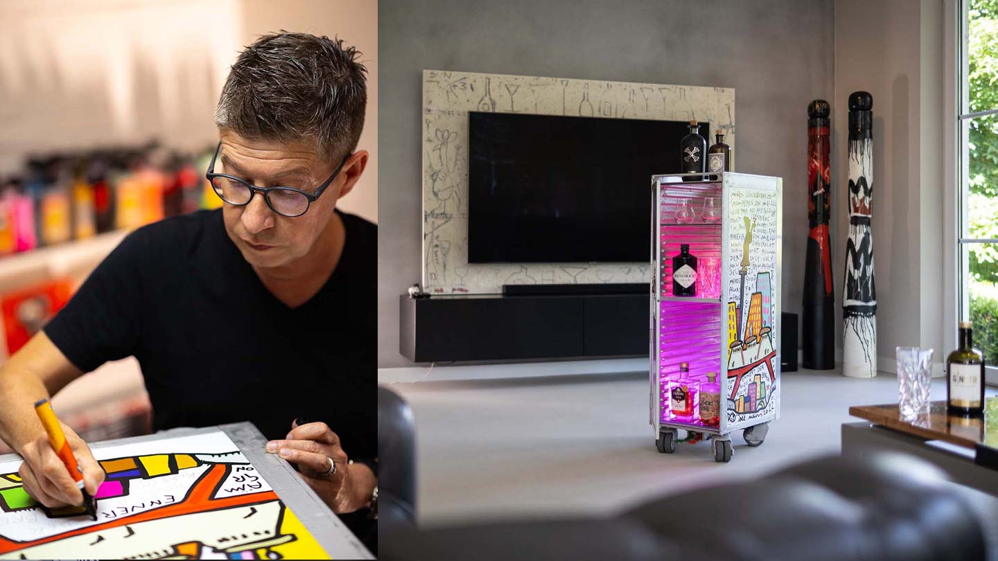 Individuell bemalter Flugzeugtrolley mit rosa LED-Licht als Bartrolley im Wohnzimmer, Künstler bei der Gestaltung