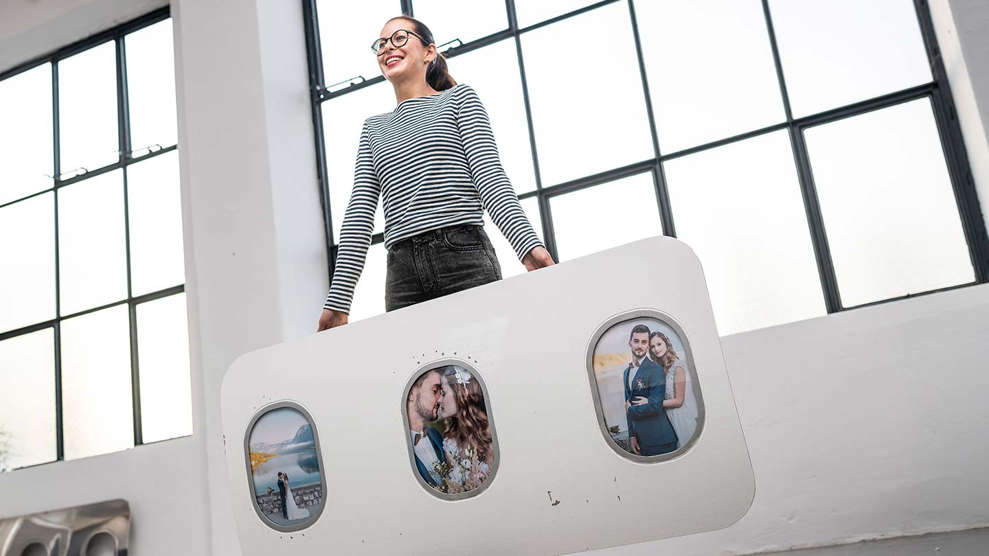 Airplane wall bar made from original aircraft parts, carried by woman, gift for travellers
